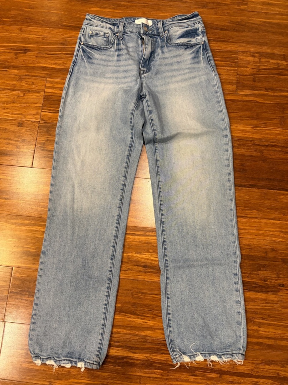 Women’s Light Blue Straight Leg Jeans with Frayed Hem